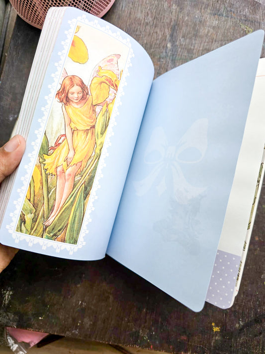 JZA5128-2557 | Flower Fairies Notebook Featuring The Lris Fairy Illustration By Cicely Mary Barker from the Flower Fairies Of The Alphabet Collection
